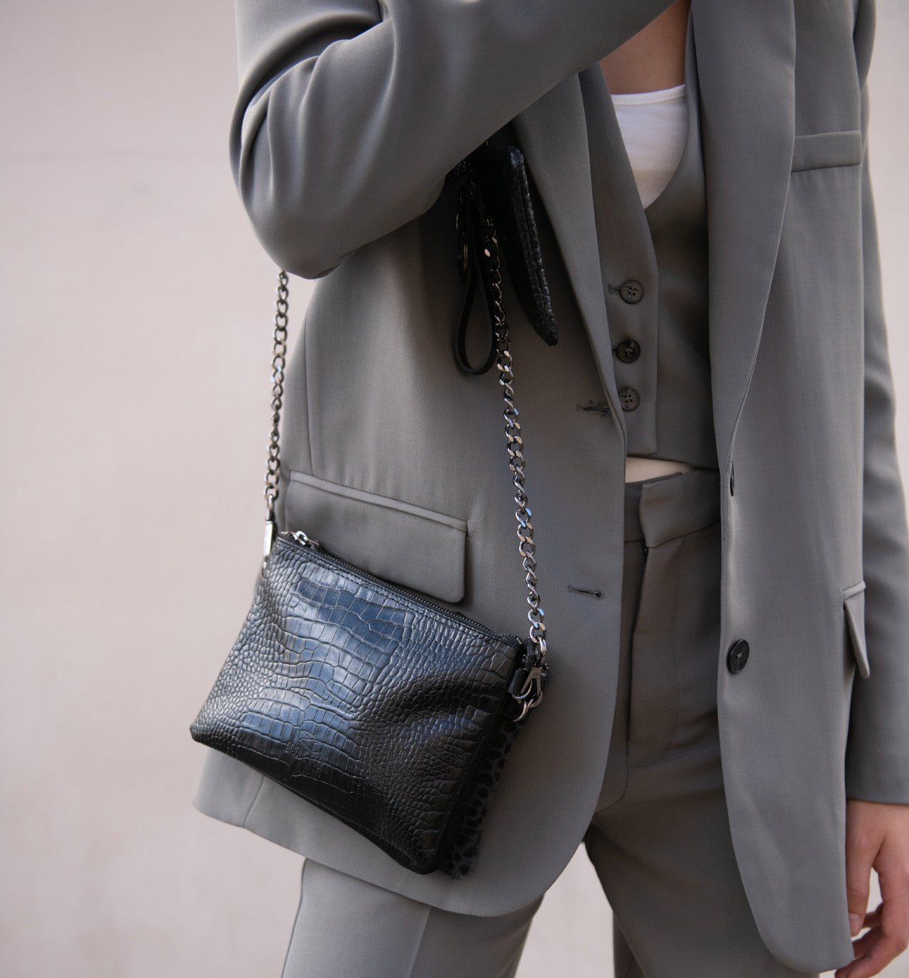 Black crocodile zipped trio and gray Leo pony